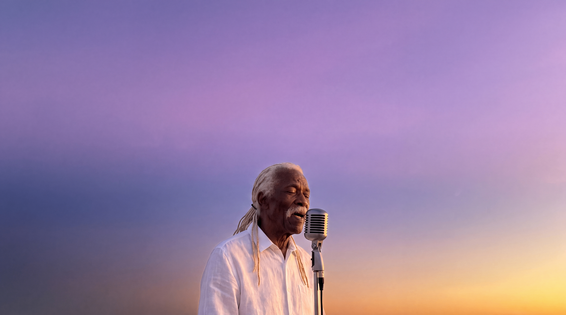 Dusty Rivers singing at sunset